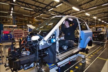 afp : A general view of a production line in the factory of Norwegian electric car maker Think, is pictured on December 13, 2008 in Oslo. Despite a winning and timely