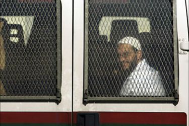 r_Suspects leave the courthouse in Sale, near Rabat January 22, 2009. Members of the Moroccan Islamic Combatant Group's (MICG) military committee are suspected to be