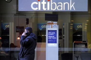 afp ; People walk past a Citibank branch in New York on February 23, 2009. US authorities unveiled details of a new aid plan for struggling banks that appears to stop short of