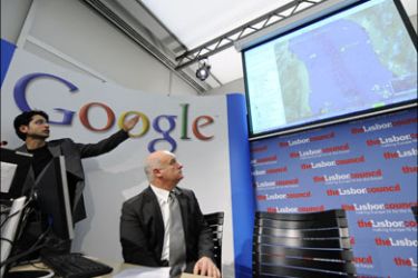 afp EU fisheries and maritime affairs commissioner Joe Borg (R) and Googles Product Marketing Manager Amit Sood (L) announce Google Ocean on February 02, 2009, in