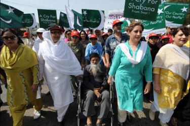afp ; Pakistani human rights activists Abdul Sattar Edhi (C) and artist Laila Zubari (2R) march during the International Women's Day rally in Karachi on March 8, 2009. Nearly 100