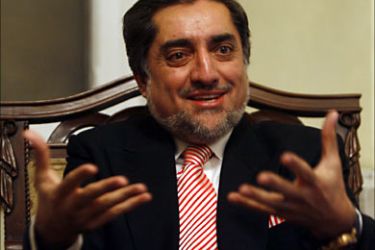r_Former Afghan foreign minister Abdullah Abdullah speaks in an interview with Reuters in Kabul March 3, 2009. Afghanistan's President Hamid Karzai should stand down