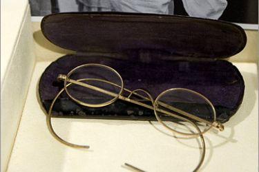 AFP - Mahatma Gandhi's round glasses at the auction house Sunday.March 1, 2009 in New York. The sale of the items, branded an "insult" by the independence leader's family, will go ahead March 5, according to the New York-based