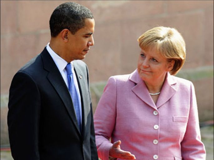 afp : German Chancellor Angela Merkel and US President Barack Obama inspect a military honor guard on April 3, 2009 in Baden-Baden, southern Germany. They met for