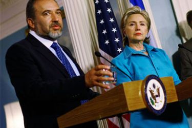 U.S. Secretary of State Hillary Clinton (2nd L) and Israeli Deputy Prime Minister and Minister of Foreign Affairs of Israel Avigdor Lieberman hold a joint