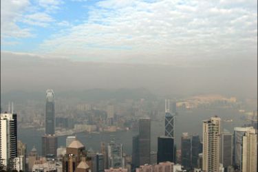 afp : (FILES) File photo taken December 24, 2008 shows the view from "The Peak" in Hong Kong, and a level of haze hanging over Victoria harbour while blue skies try to break