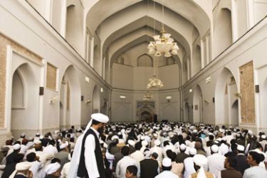 Afghan worshippers attend Friday prayers at Jamee Mosque in Herat, western