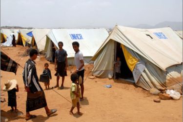 Displaced Yemenis from Saada province in northern Yemen, are seen at a camp set up by the United Nations High Commissioner for Refugees