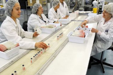 Employees of H1N1 vaccine manufacturer CSL work on a production line in Melbourne on September 24, 2009 as a program to develop a swine flu vaccine in Australia has produced a vaccine which its maker says will have a 95 per cent success rate in adults.