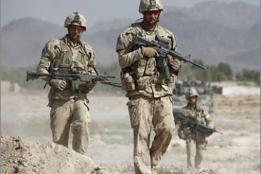 Canadian soldiers patrol near the village of Salavat in the Panjwaii district of Kandahar province