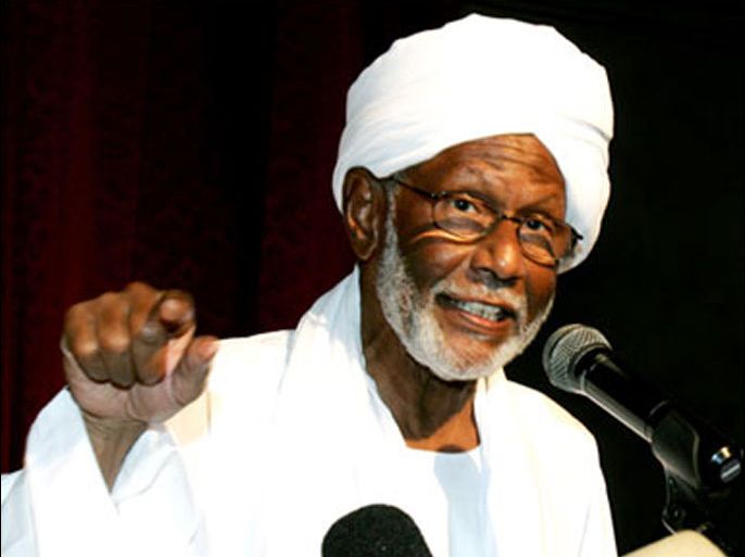 Sudanese Islamist opposition leader Hassan al-Turabi addresses the closing session of a conference of opposition political parties in Juba, the capital