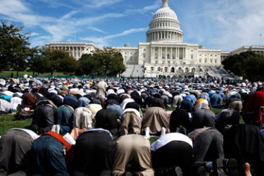 Muslims say prayer during the "Islam on Capitol Hill 2009" event at the West Front Lawn of the U.S. Capitol