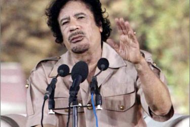 Libyan leader Moamer Kadhafi speaks during a celebration marking the 50th anniversary for the founding of the Free Unionist Movement in the southern city of Sebha, late October 5, 2009