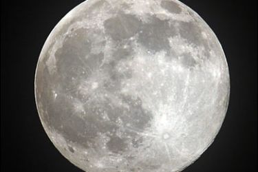 (FILES)A full Moon rises over the Northern Indian city of Mohali in this November 2, 2009 file photo. A "significant amount" of frozen water has been found on the moon, the US space agency NASA said on November 13, 2009.