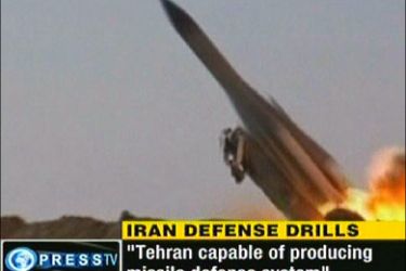 afp : An image grab taken from Iran's satellite English-language official Press TV station shows the test launch of a missile during military manoeuvres at an undisclosed