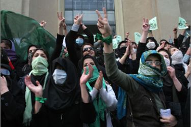 Iranian opposition supporters demonstrate at Tehran University in the Iranian capital on December 7, 2009. Iranian police firing tear gas clashed with crowds of protesters in central Tehran as opposition supporters used Students Day commemorations to stage fresh anti-government demonstrations. AFP PHOTO/STR