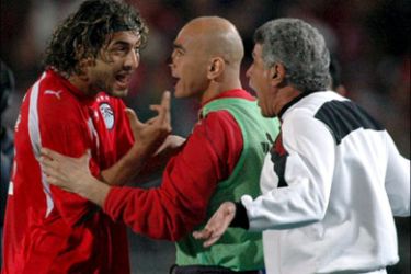 epa : epa00634617 (FILES) Egypt's star striker Ahmed "Mido" Hossam (L) taken 20 January 2006 during the African Nations Cup in Egypt. Mido has been banned for six