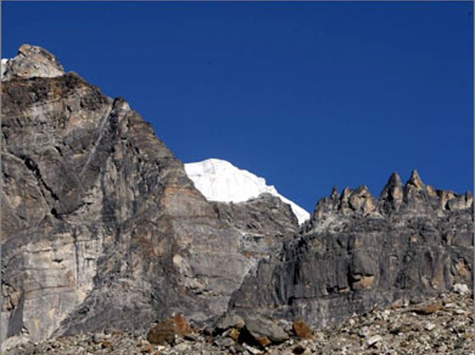 This photograph taken on December 4, 2009 shows a rockface exposed by a melted glacier in the Everest region some 140 km (87 miles) northeast of Kathmandu.
