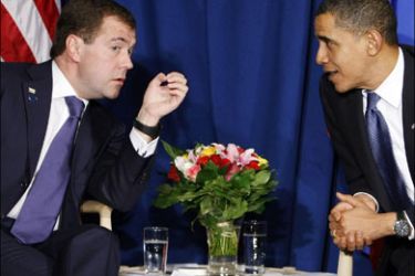 r : U.S. President Barack Obama (R) meets his Russian counterpart Dmitry Medvedev at the Bella Center in Copenhagen December 18, 2009. World leaders tried to