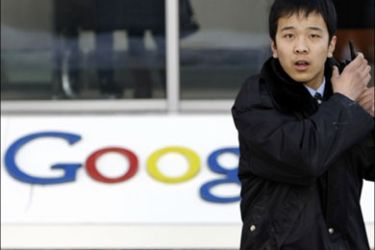 r - A security walks in front of the Google China headquarters in Beijing January 13, 2010. Google Inc said it may pull out of China because it is no longer willing to accept censorship of its search results, in a surprise retreat from the world's largest Internet market by users