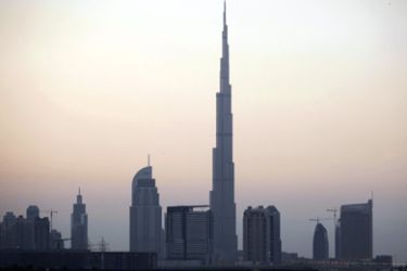 A general view of the Burj Dubai, the world's tallest tower, in Dubai January 3, 2010. Started at the height of the economic boom and built by some 12,000 labourers, the world's tallest building will open on Monday in Dubai as the glitzy emirate seeks to rekindle optimism after its financial crisis.