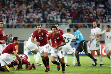 f_Hosny Abd Rabo (C) of Egypt celebrates his goal from penalty against Algeria during their semi final match in the African Cup of Nations CAN2010