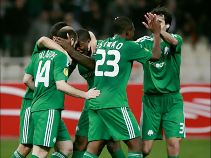 r_Panathinaikos' players celebrate after scoring against AS Roma during their Europa League last 32 first leg soccer match at Olympic stadium in Athens February 18, 2010