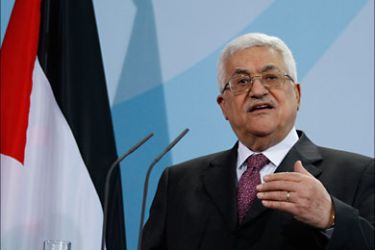 r_Palestinian President Mahmoud Abbas speaks during a news conference after talks with German Chancellor Angela Merkel at the Chancellery in Berlin February