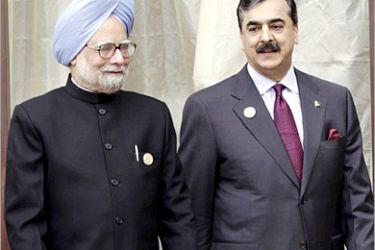 REUTERS/ India's Prime Minister Manmohan Singh (L) and his Pakistani counterpart Yusuf Raza Gilani walk before their meeting at the 16th summit of the South Asian Association for Regional