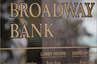 A sign marks the location of a Broadway bank branch in Chicago, Illinois on April 23, 2010 in Chicago, Illinois. The bank, which is owned