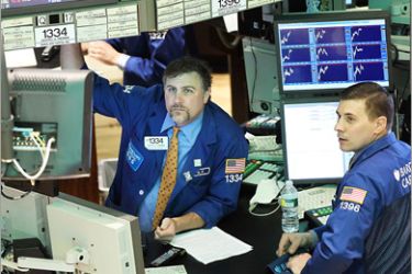 /AFP - Traders work on the floor of the New York Stock Exchange on May 25, 2010 in New York City. The Dow Jones industrial average was down nearly 200 points in afternoon trading as fears continue about the European debt crisis and new fears of escalating tension between North a