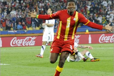 AFP - Ghana's striker Asamoah Gyan celebrates after scoring against the USA during extra time of their 2010 World Cup round of 16 football match at Royal Bafokeng stadium in Rustenburg, South Africa, on June 26, 2010.