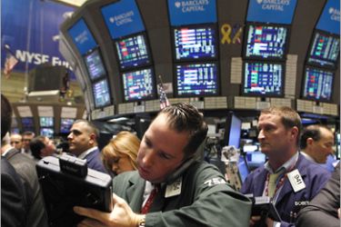 REUTERS/ Traders work on the floor of the New York Stock Exchange June 17, 2010. REUTERS/Brendan McDermid (UNITED