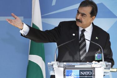 Pakistan's Prime Minister Yusuf Raza Gilani addresses a news conference after meeting NATO Secretary General Anders Fogh Rasmussen at the Alliance headquarters