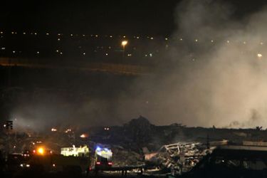 Smoke rises from the the crash scene of a cargo plane owned by US courier United Parcel Service (UPS) at a military base in Dubai, late on September 3, 2010. The Boeing 747-400 caught fire shortly after take-off and crashed, killing both crew members, civil aviation authorities said. AFP PHOTO/KARIM SAHIB
