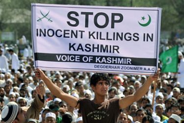 A Kashmiri protester holds a banner during an anti-India rally in Srinagar on September 11, 2010. The Muslim-majority Kashmir valley has been rocked by unrest since a teenage student was killed by a police tear-gas shell on June 11