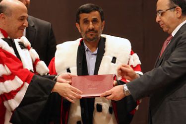 Beirut, -, LEBANON : Iranian President Mahmoud Ahamdinejad recieves an honorary doctorate in political science from the state-run Lebanese University in Beirut on October 14