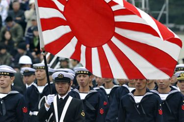 Troops of the Maritime Self-Defense Force attend an inspection parade at the Asaka base in suburban Tokyo on October 24, 2010
