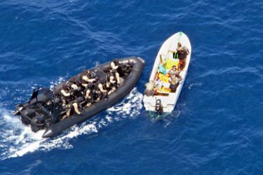 A picture released by the EU Navfor and taken on November 3, 2010 shows the EU Navfor SPS Galicia boarding team intercepting a skiff with four people on board along the Kenyan coastline