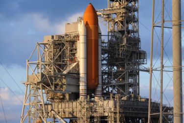 The space shuttle Discovery is lit by early morning sunlight on Pad 39A on November 2, 2010 at Kennedy Space Center in Florida as preparations are made for a scheduled November 3, 2010 launch.