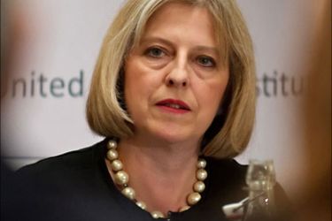 f_British Home Secretary, Theresa May, addresses guests during a speech at Royal United Services Institute (RUSI), in central London on November 3, 2010.