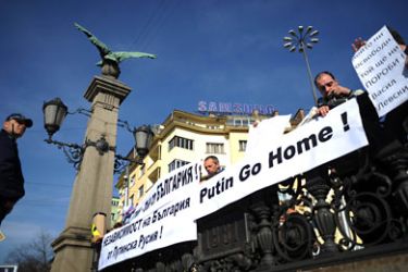 Bulgarian protestors attend a rally against the upcoming visit of Russia's Prime Minister Vladimir Putin in Sofia on November 13, 2010. Bulgaria's state energy holding BEH and Russian gas giant Gazprom