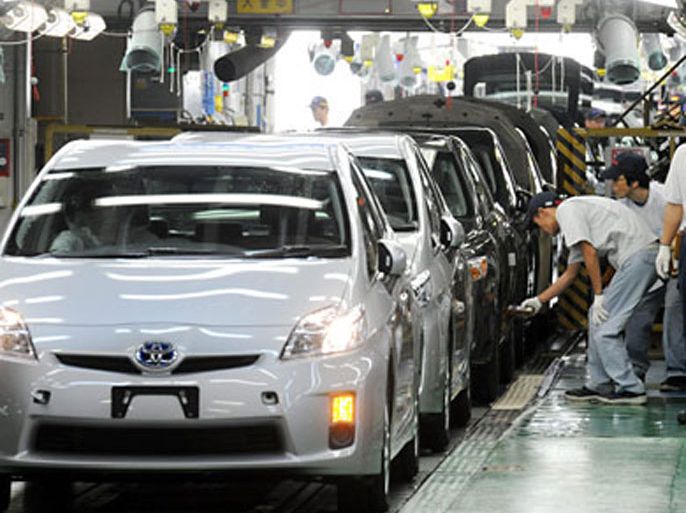 epa02467485 (FILE) A file photo dated 05 June 2009 shows Japanese autoworkers inspecting Toyota Motor Corp.'s third-generation hybrid 'Prius' cars coming off the assembly line at the automaker's Tsutsumi plant in Toyota city, Aichi province, Japan.