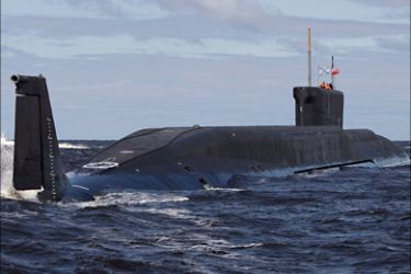 r_The Yuri Dolgoruky, a Russian nuclear submarine, is seen in the waters off Severodvinsk in this July 2, 2009 file photo. The submarine, slated to carry Russia's next generation
