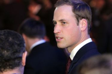 Britain's Prince William (R) speaks with an unidentified member of the English delegation following the official announcement of the 2018 World Cup host country on December 2, 2010 at the FIFA headquarters in Zurich. Russia and the tiny Gulf state of Qatar were awarded the 2018 and 2022 World Cups today after an acrimonious bidding war marred by allegations of corruption and illegal deal-making.