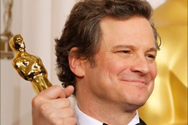 r_British actor Colin Firth, best actor winner for his role in "The King's Speech," poses with his Oscar backstage at the 83rd Academy Awards in Hollywood, California