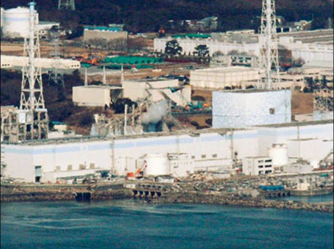 An aerial view shows Fukushima Daiichi nuclear power plant in Fukushima in this March 17, 2011 file photo. From R-L: Reactors 1 to 4 are seen in this picture taken more than 30km (18 miles) offshore from the site shortly before the start of the water-dropping operation.