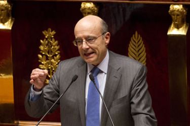 French Foreign Affaires Minister Alain Juppe addresses the parliament during a debate on Libya at the National Assembly in Paris, France, 22 March 2011. Juppe, French Prime Minister Francois Fillon, and French Defense Minister Gerard Longuet (both unseen) addressed the parliament about France's military involvement in Libya. /