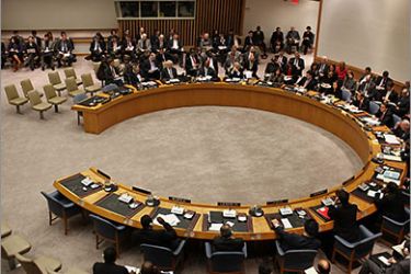 NEW YORK, NY - MARCH 24: Attendees participate in a United Nations Security Council meeting where the situation in Libya was discussed on March 24, 2011 at the United Nations headquarters in New York City. The Secretary