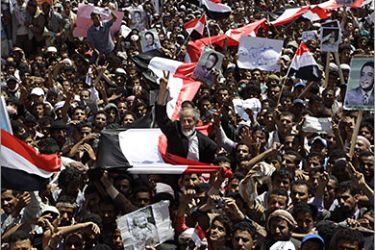 Anti-government protesters shout slogans during a protest demanding the ouster of Yemen's President Ali Abdullah Saleh outside Sanaa University March 1, 2011. Tens of thousands of protesters flooded Yemen's streets on Tuesday,